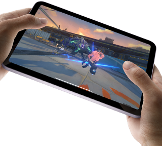 iPad mini held by a user's hands in landscape view playing a graphically intense game